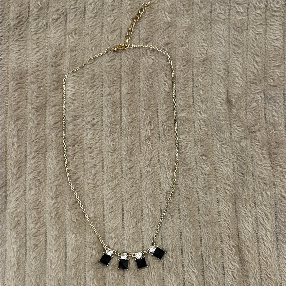 Elegant Gold and Black Necklace